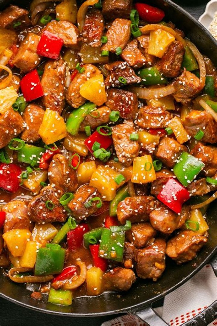Grain served with sweet and sour pork