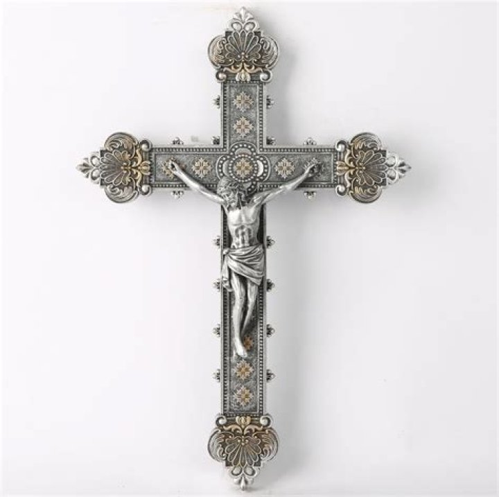 LA Times Gold element of some religious paintings Crossword Clue Answers with 4 letters