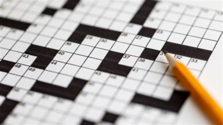 LA Times Residue from an orange snack Crossword Clue