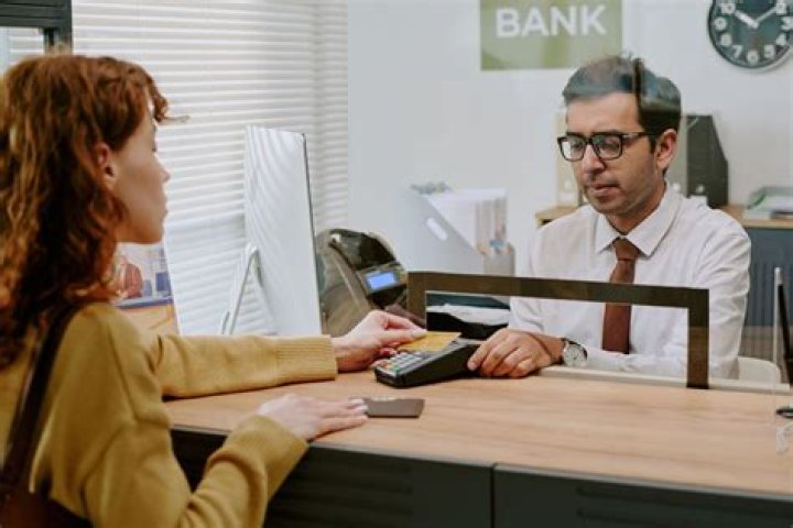 NYT Security officer with an eye on teller transactions Crossword Clue