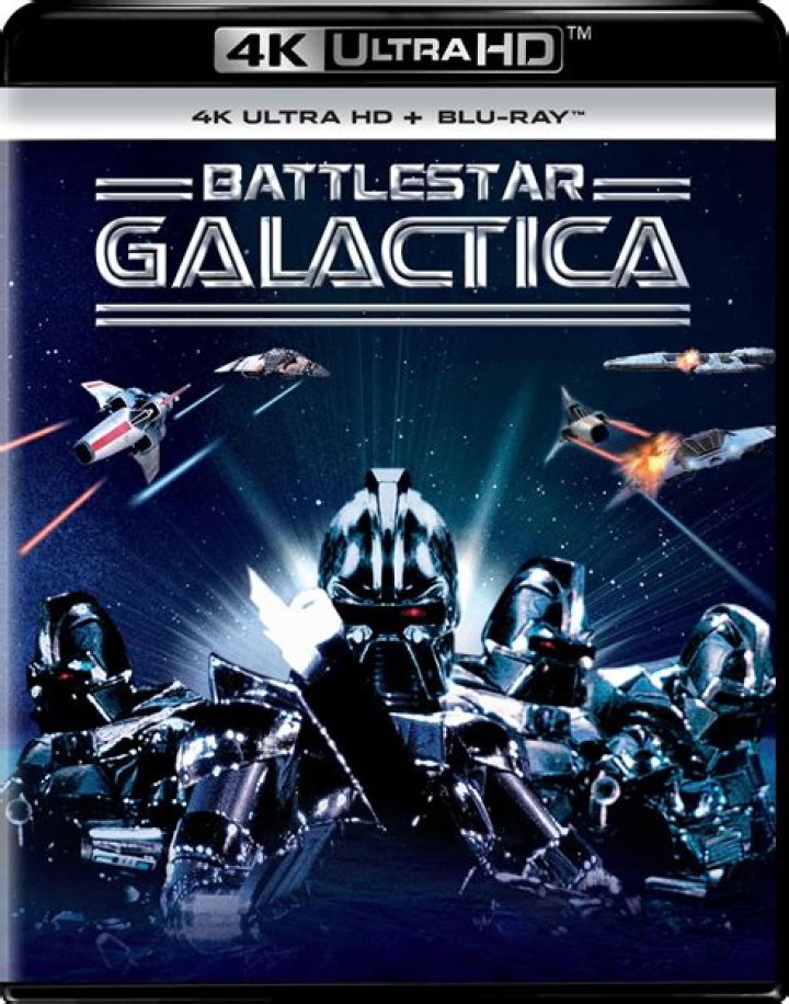 Robotic adversary in “Battlestar Galactica” Crossword Clue