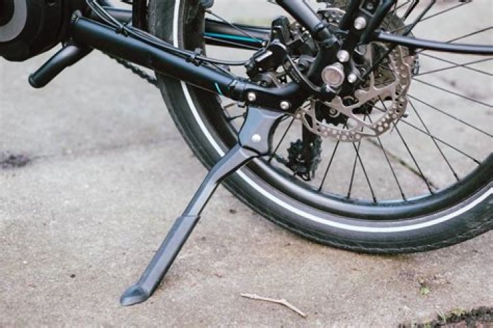 ___ up (keep from toppling over like a kickstand does for a bike)