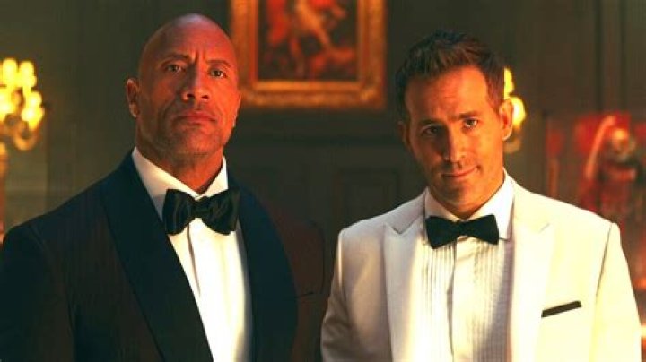 Upcoming action thriller featuring two People's Sexiest Man Alive winners (Dwayne Johnson and Ryan Reynolds): 2 wds.