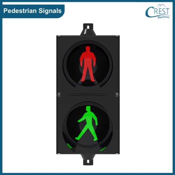 What a green-colored pedestrian symbol indicates at an intersection